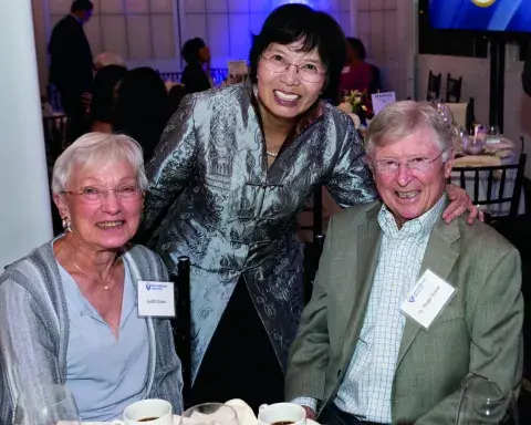 President Wang and SMU supporters the Eckers at an event wearing formals.
