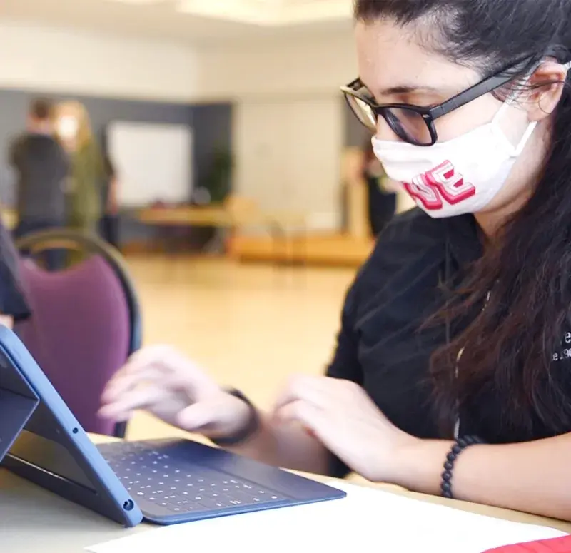 Student works with iPad.